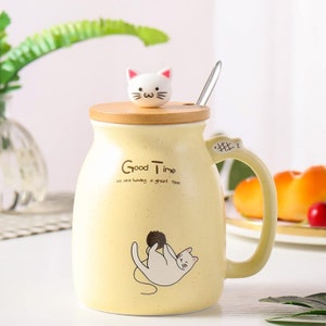 Kitty Cup Tassen-Set im Katzen-Design: Mit Deckel & Löffel I Katzentasse für Tierliebhaber zum Kaffee, Tee I Geschenkidee für Katzenfreunde Bild 1