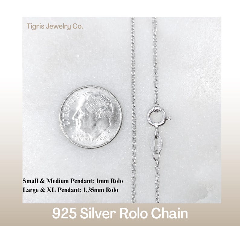 May include: A close-up of a silver 925 Rolo chain with a dime for size comparison. The chain is shown with a clasp and the text reads "Small & Medium Pendant: 1mm Rolo, Large & XL Pendant: 1.35mm Rolo". The brand name "Tigris Jewelry Co." is also visible.