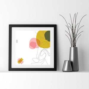 May include: Abstract art print with a white background, featuring a yellow, green, and pink circle design. The print is framed in a black frame.