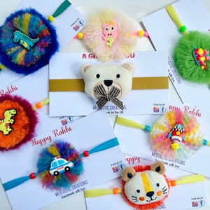 Zwierzę rakhi, słodkie rakhi, świnka Peppa rakhi, samochód rakhi, lew rakhi, koala rakhi, dziewczyny rakhi, dzieci rakhi, chłopcy rakhi, helikopter rakhi, astronauta