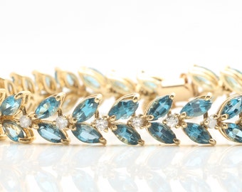 11.84 Carat Natural Blue Topaz and Diamonds in 14K Solid Yellow Gold Bracelet