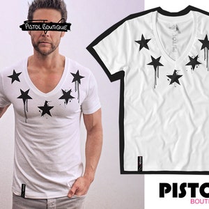 May include: White V-neck t-shirt with a black star design and the text "PISTOL BOUTIQUE" across the chest.