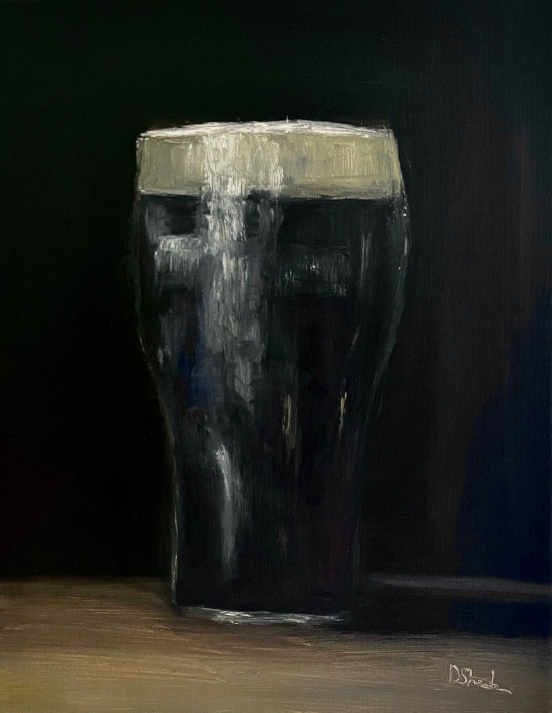 May include: Oil painting of a pint of stout, a dark beer, with a creamy white head. The glass is a classic pint shape, filled with the dark liquid. The background is a deep black, and the painting is on a wooden surface.