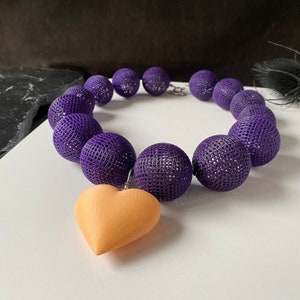 Brutalist Bold Heart Necklace - Iris Apfel Maximalist Design with Detachable Pendant, Purple Beads, and Big Orange Charm