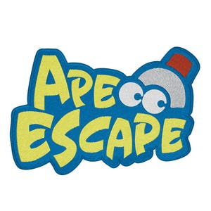 May include: Embroidered patch with the words "APE ESCAPE" in yellow, outlined in blue. The patch features a cartoon ape head with white eyes and a red hat. The patch is on a white background.