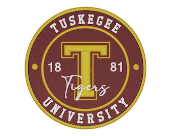 May include: Embroidered patch featuring the Tuskegee University seal. The design includes a maroon background with a gold border and lettering. The text reads "Tuskegee University" and "Tigers", with the founding year "1881".