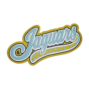 May include: An embroidered fabric patch featuring the word Jaguars in light blue script lettering with a white outline. The design includes a yellow tail flourish with light blue polka dots, all bordered by a thick, solid yellow stitched edge.
