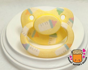 Baby Bottles on Yellow Waterproof Fabric Decorated Adult Pacifier for Adult Babies, Little Space