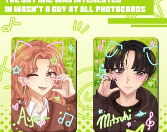 May include: Two anime-style photocards with green and white accents. One card features a woman with pink hair, the other a man with black hair. Text on the cards includes "Aya" and "Mitsuki". The top text reads "THE GUY SHE WAS INTERESTED IN WASN'T A GUY AT ALL PHOTOCARDS".