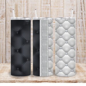 May include: Three stainless steel tumblers with different designs. The first tumbler has a black quilted pattern. The second tumbler has a silver quilted pattern with rhinestones. The third tumbler has a white quilted pattern with rhinestones.