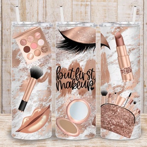 May include: Three stainless steel tumblers with rose gold accents and a makeup theme. The first tumbler features a makeup palette, a makeup brush, and a rose gold lip. The second tumbler features a rose gold eye with eyelashes, a compact mirror, and the text "but first makeup". The third tumbler features a rose gold lipstick, a makeup bag with brushes, and a rose gold glitter background.
