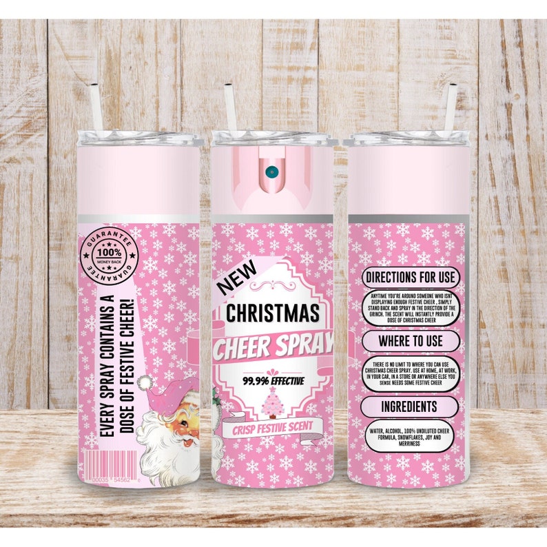 May include: A pink Christmas Cheer Spray tumbler with a white straw. The tumbler features a festive design with snowflakes, a Santa Claus illustration, and the text "New Christmas Cheer Spray".