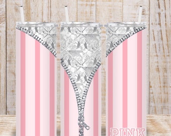 May include: A pink and white striped tumbler with a silver zipper design. The zipper is open to reveal a silver diamond pattern. The word "PINK" is printed on the bottom of the tumbler.