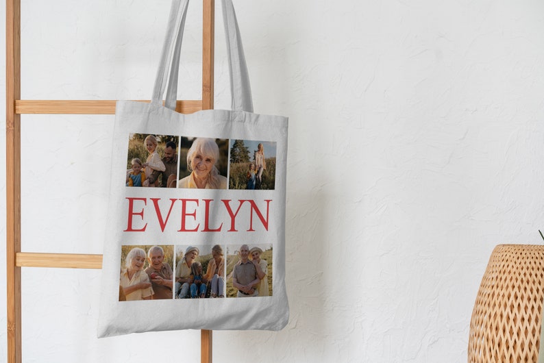 May include: A white canvas tote bag with a collage of family photos and the name "EVELYN" printed in red.