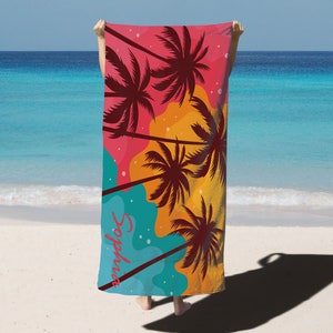 May include: A beach towel with a colourful design featuring palm trees and the text "#sunnydays".