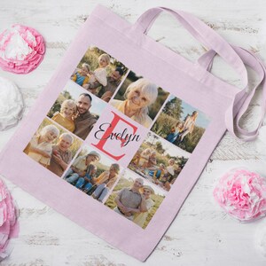 May include: A pink canvas tote bag with a photo collage of a family. The photos are arranged in a grid pattern and feature a variety of people, including children, adults, and seniors. The bag also has the name "Evelyn" printed on it in a cursive font.