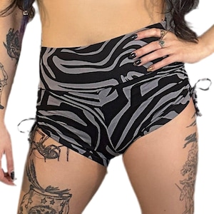 Zebra STRIPED HELIA SHORTS By 5&D x Stellar Dust - Gray / Black Zebra Striped Festival Shorts, Sexy Booty Cut Shorts With Synch Sides