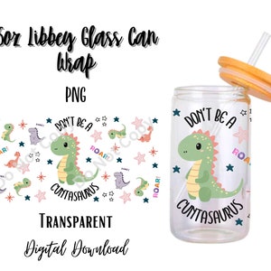 May include: A 16 ounce glass can wrap with a green dinosaur design. The design features a green dinosaur with the text "Don't be a Cuntasaurus" and stars. The wrap is transparent and can be used to personalize a glass can.