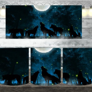 May include: A dark blue mug with a full moon and a pack of wolves howling in a forest setting. The wolves are silhouetted against the moon and the forest.