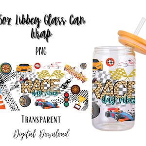 May include: A clear 16oz Libbey glass can wrap with a race car theme. The design includes race cars, checkered flags, and the text "Race Day Vibes". The glass has an orange lid and straw.