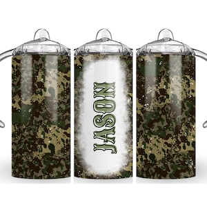 May include: Three stainless steel tumblers with a camouflage pattern. The center tumbler has the name "JASON" in a white, distressed font on a white background.