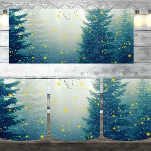 May include: A white ceramic mug with a design of a foggy forest with blue and green trees and yellow lights. The mug is perfect for hot beverages.