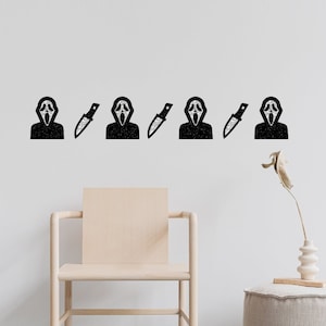 May include: A white wall with a black and white graphic of a masked figure and a knife repeated across the wall. A light wood chair and a light beige ottoman are in front of the wall.