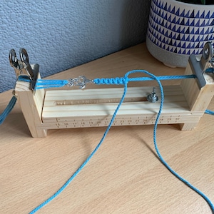 Strike a store cord bracelet loom