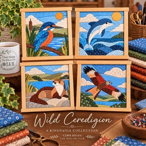 May include: Four square fabric art pieces in light wood frames featuring quilted scenes of a kingfisher, a dolphin, an otter, and a red kite. The artwork displays detailed textile patterns and vibrant colours depicting wildlife in natural landscapes.