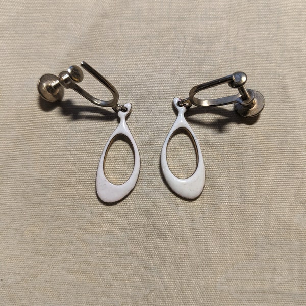 Intriguing pair of Vintage Kim Craftsmen© Panited Drop-shaped clip on Earrings