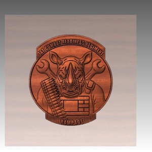 May include: A circular wooden emblem featuring a rhino head, wrenches, and the text "1st Combat Readiness Regiment" and "Rampage". The rhino is centered, with a bandolier and a rectangular design below.