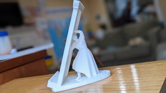 Luisa Madrigal Cell Phone Stand, the Perfect Gift for Office Desk