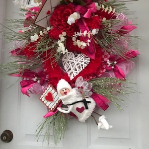 Cupido bezorgt Valentijnsdag bloemen en kaarten, engel, liefde, Valentijnsdagkrans, hartkrans, cupido-pijlen, rozen voor valentijnskaarten, krans