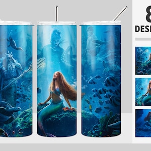 May include: Eight different designs for a stainless steel tumbler featuring a mermaid and underwater scenes. The tumbler is blue with a white lid and straw. The designs include a mermaid with long flowing hair, a mermaid with a crown, a mermaid with a seashell, a mermaid with a fish, a mermaid with a starfish, a mermaid with a coral reef, a mermaid with a dolphin, and a mermaid with a seahorse.