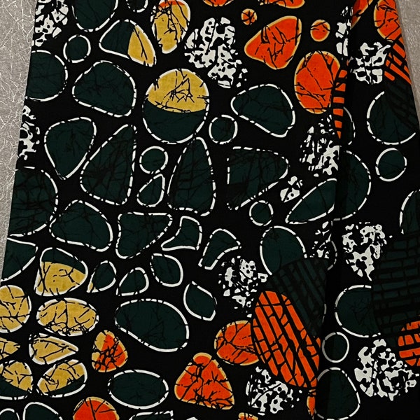 Impression textile africain motif galets vert malachite, orange, jaune, tissu Wax Afrique de l'Ouest | Tissus en coton par mètre