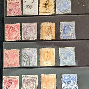 May include: A collection of vintage stamps from the Straits Settlements and Malaya. The stamps feature various denominations and designs, including portraits of Queen Victoria and King George V. The stamps are in good condition and would be a great addition to any stamp collection.