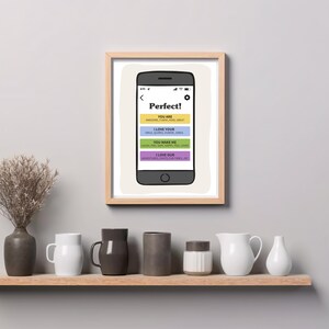 May include: A framed print featuring a smartphone illustration with the text Perfect! followed by four colored bars containing the phrases YOU ARE, I LOVE YOUR, YOU MAKE ME, and I LOVE OUR, each with smaller descriptive words listed below.