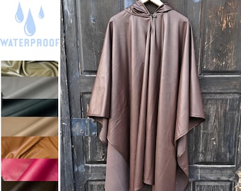 Rain poncho OLAND Unisex ruana cape waterproof - black rain jacket poncho with hood Comfortable cloak windproof waterproof In2Nord