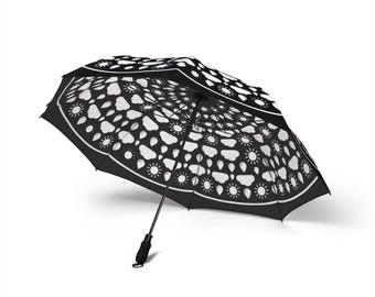 Paraguas plegable con estampado de mandala en blanco y negro
