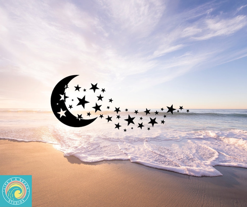 May include: A black crescent moon with stars trailing behind it, set against a backdrop of a beach with white foamy waves and a blue sky with white clouds.