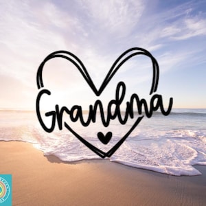 May include: A black heart-shaped graphic with the word "Grandma" in a cursive font. A small heart is at the bottom of the heart shape. The background is a beach scene with a blue sky and ocean waves.