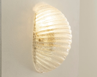 Murano glass shell wall sconce in crystal colour with brass structure, Made in Italy wall lamp