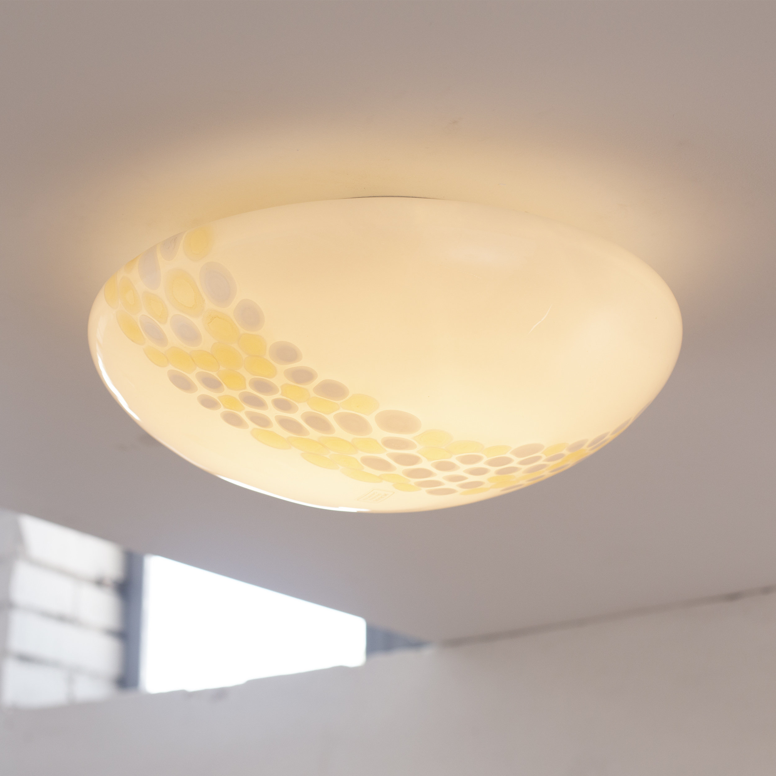 Milky white Murano glass ceiling lamp with amber and white murrine band decoration, Ø38 cm, Made in Italy 1980s