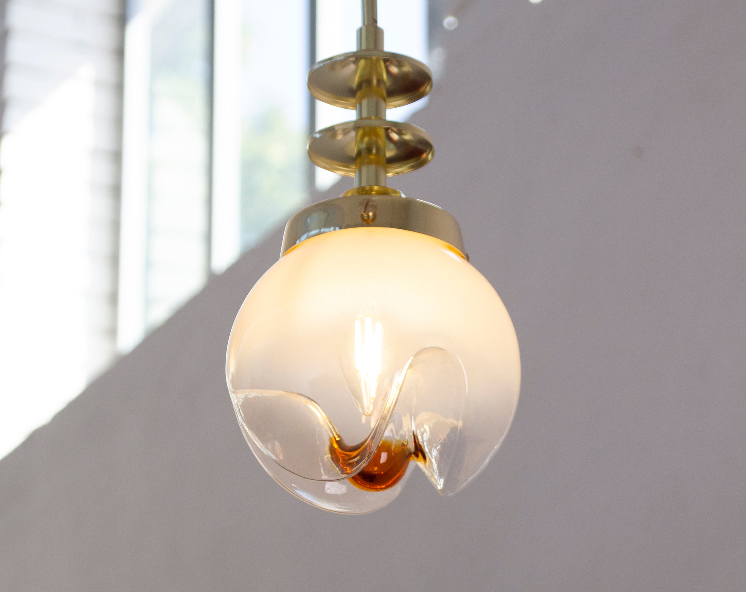 White shaded vintage Murano glass sphere pendant with amber decoration diameter 15 cm, space age italian design suspension lamp