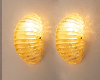 Set of 2 Murano glass shell wall sconce in amber colour with brass structure, Made in Italy wall lamp