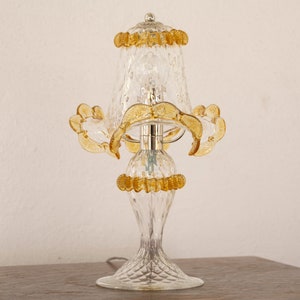 Clear Murano glass table lamp with artistic amber color decoration, handmade Made in Italy
