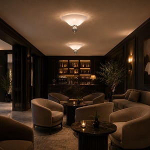 a luxurious and elegantly furnished living room with dark wood paneling, plush sofas, and a bar area with shelves of bottles. The room is illuminated by two pendant lights hanging from the ceiling, creating a warm and inviting atmosphere.