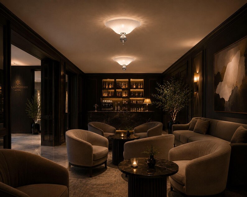 a luxurious and elegantly furnished living room with dark wood paneling, plush sofas, and a bar area with shelves of bottles. The room is illuminated by two pendant lights hanging from the ceiling, creating a warm and inviting atmosphere.