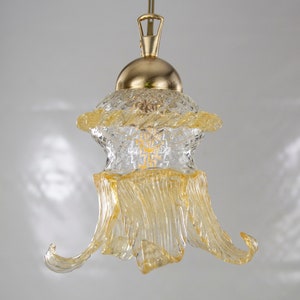 Handmade Murano glass suspension lamp, decorated crystal color and amber gold details, flower chandelier design Made in Italy
