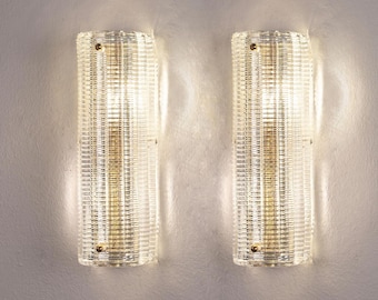 Wandlampenset: Murano glas met optische textuur, messing frame in art deco-stijl